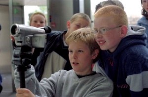 Children filming an advert